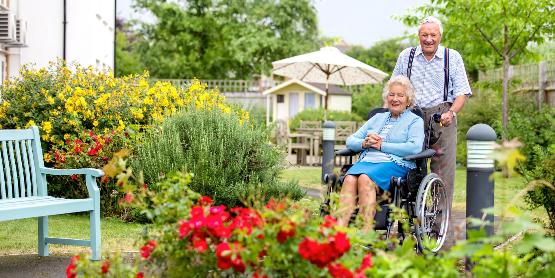 Lady in Wheel Chair, looking at garden. 
