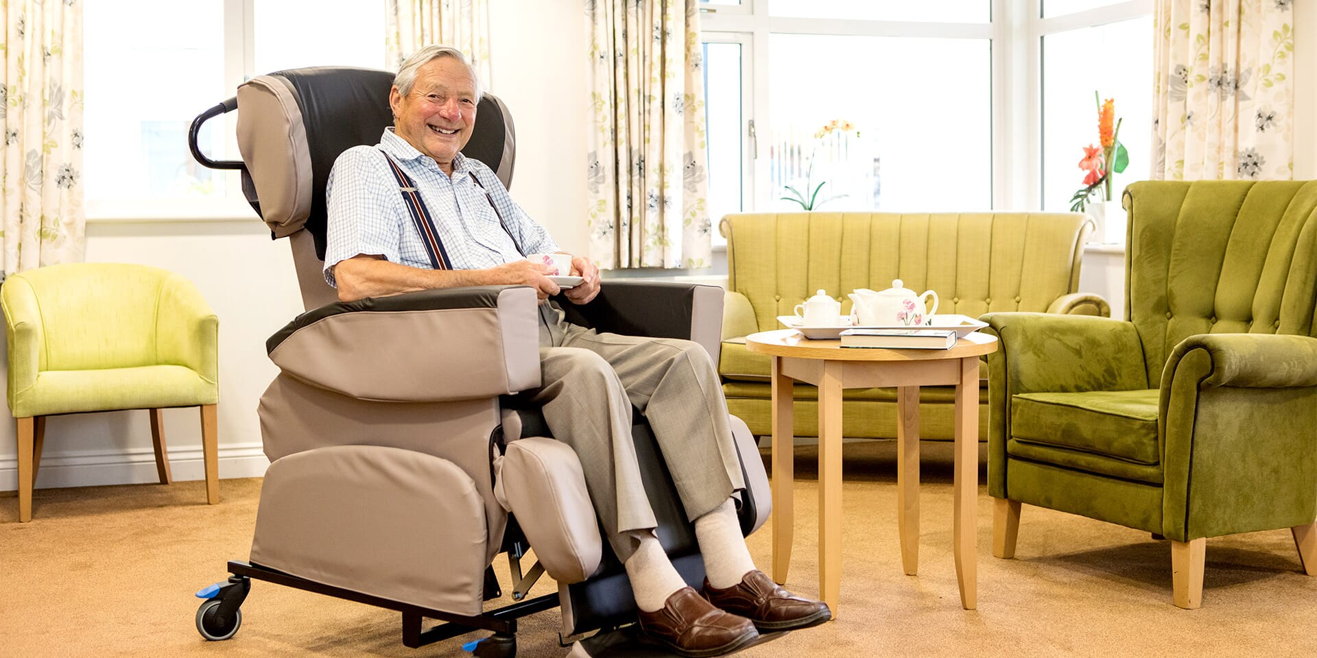 Man Sat in Careflex Specialist Seating. Right Facing.