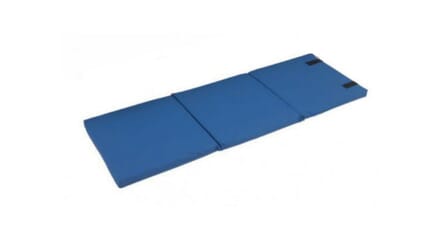 Folding Crash Mat. Blue Crash Matt on the Floor.