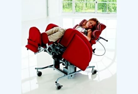 Kirton Duo Mini Chair with user reclined, Red.