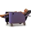 Kirton Encora Chair. Purple With Reclined Female User.