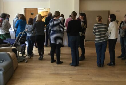 Groups of People Following a Seating and Posture Product Workshop,