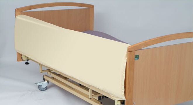 Folding Full Length Bumper. Wooden Frame with Cream Mattress.