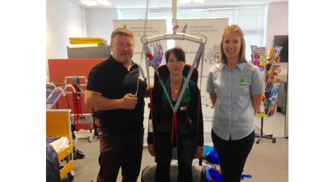 Three Female Health Care Professionals Stand in a Row at a Product Workshop for Vale of Glamorgan Cardiff.