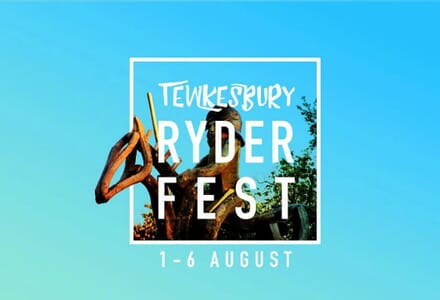 Tewkesbury Ryder Fest, Featuring Wooden Horse and Ride on Blue Background.