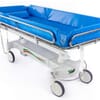 Timo Electric High-low Shower Trolley. Blue Side View.