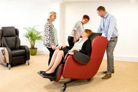 Tilt in Space (TiS) Chair Red. User Reclined.